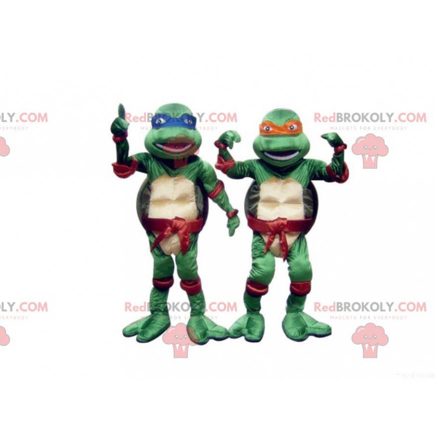 2 Maskottchen mit blauen und orangefarbenen Ninja Turtles -