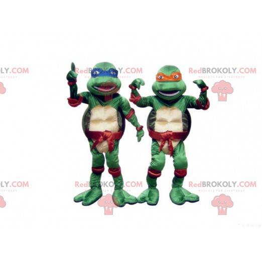 2 maskotter med blå og orange Ninja Turtles - Redbrokoly.com