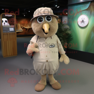 Beige Kiwi mascot costume character dressed with a Henley Shirt and Hats