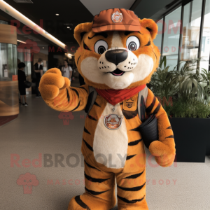Rust Tiger mascot costume character dressed with a Rash Guard and Berets
