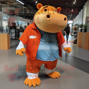 Orange Hippopotamus mascot costume character dressed with a Denim Shorts and Keychains