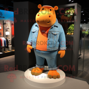 Orange Hippopotamus mascot costume character dressed with a Denim Shorts and Keychains