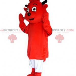 Mascota de Red Imp con pantalones cortos blancos -