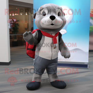 Gray Otter mascot costume character dressed with a Dress Pants and Backpacks