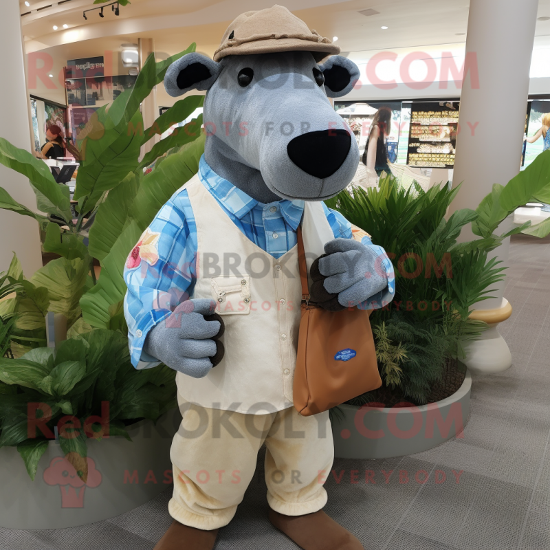 Tan Tapir mascot costume character dressed with a Chambray Shirt and Clutch bags