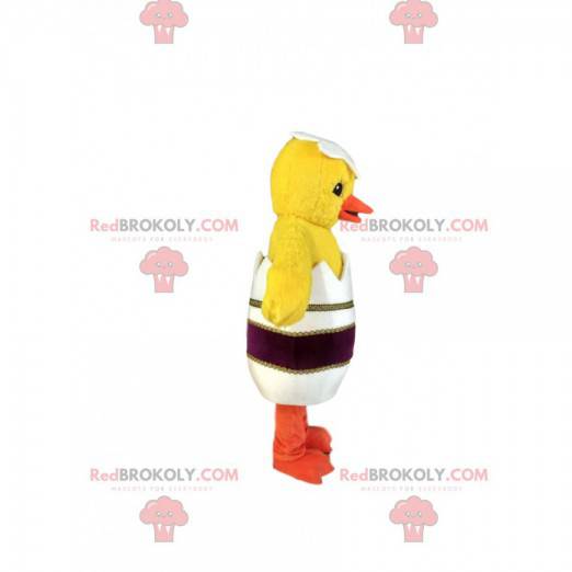 Mascot pollito amarillo con su elegante cáscara de huevo -