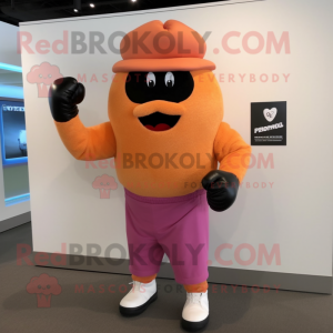 Peach Boxing Glove mascot costume character dressed with a Sweater and Berets