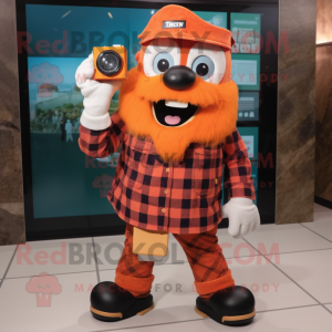 Orange Camera mascot costume character dressed with a Flannel Shirt and Digital watches