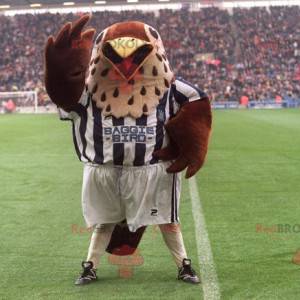 Brown and beige bird mascot in sportswear - Redbrokoly.com