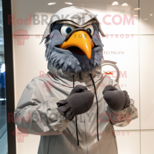 Gray Tandoori Chicken mascot costume character dressed with a Raincoat and Smartwatches