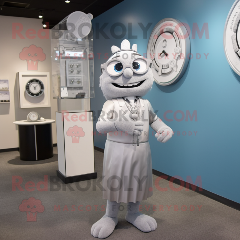 Silver Attorney mascot costume character dressed with a A-Line Dress and Bracelet watches