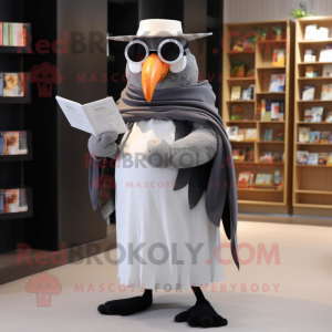 Silver Toucan mascot costume character dressed with a Wrap Dress and Reading glasses