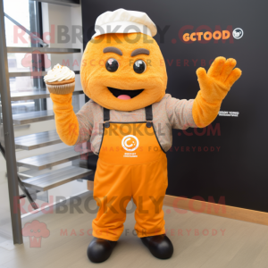 Orange Cupcake mascot costume character dressed with a Dungarees and Gloves