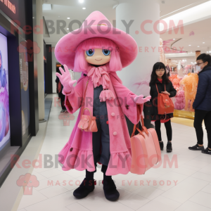 Pink Witch mascot costume character dressed with a Coat and Messenger bags