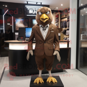 Brown Dove mascot costume character dressed with a Suit Jacket and Headbands
