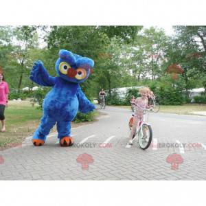 Giant blue yellow and orange owl mascot - Redbrokoly.com
