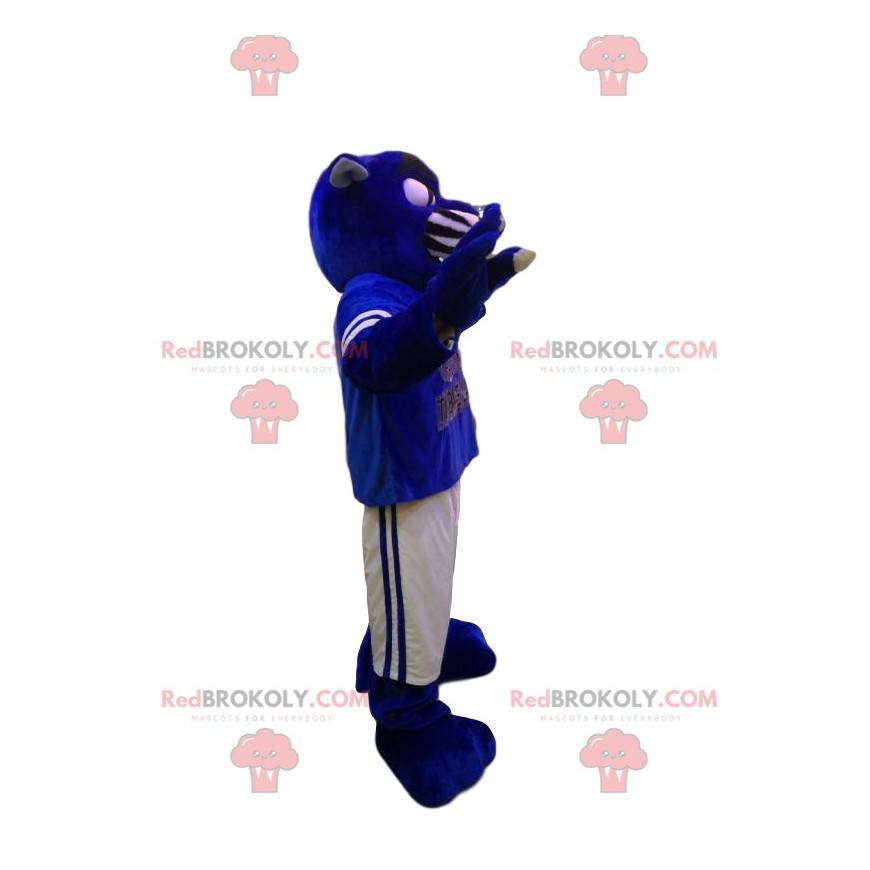 Mascotte pantera blu con abbigliamento sportivo bianco e blu -