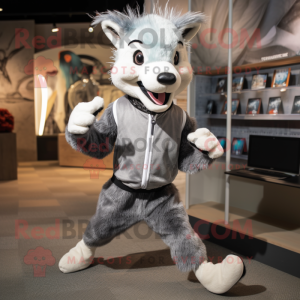 Silver Weasel mascot costume character dressed with a Running Shorts and Headbands