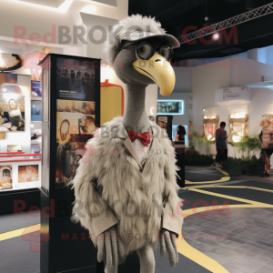 Gray Ostrich mascot costume character dressed with a Chinos and Earrings
