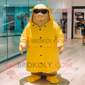 Yellow Walrus mascot costume character dressed with a Raincoat and Sunglasses