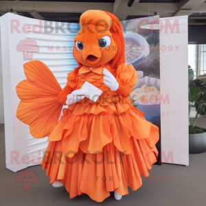 Orange Betta Fish mascot costume character dressed with a Pleated Skirt and Coin purses