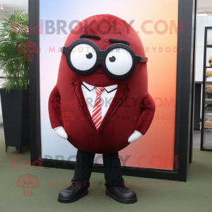 Maroon Shakshuka mascot costume character dressed with a Suit Jacket and Eyeglasses