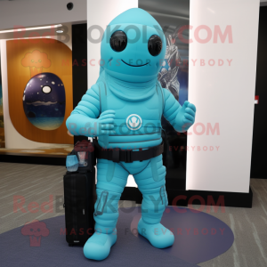 Cyan Marine Recon mascot costume character dressed with a Yoga Pants and Messenger bags