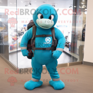 Cyan Marine Recon mascot costume character dressed with a Yoga Pants and Messenger bags