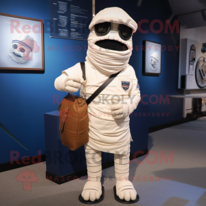 Navy Mummy mascot costume character dressed with a Polo Tee and Messenger bags
