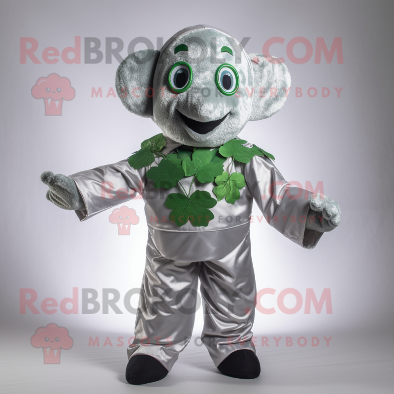 Silver Bunch Of Shamrocks mascot costume character dressed with a Dungarees and Wraps Silver Bunch Of Shamrocks mascot costume character dressed with a Dungarees and Wraps