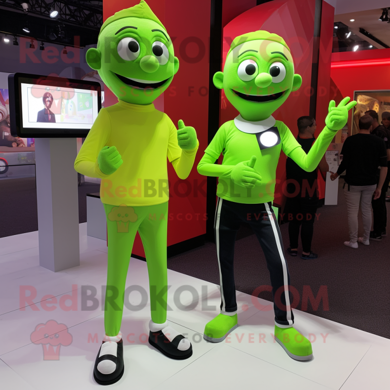 Lime Green Mime mascot costume character dressed with a Flare Jeans and Smartwatches