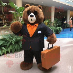 Orange Spectacled Bear mascot costume character dressed with a Suit Jacket and Tote bags
