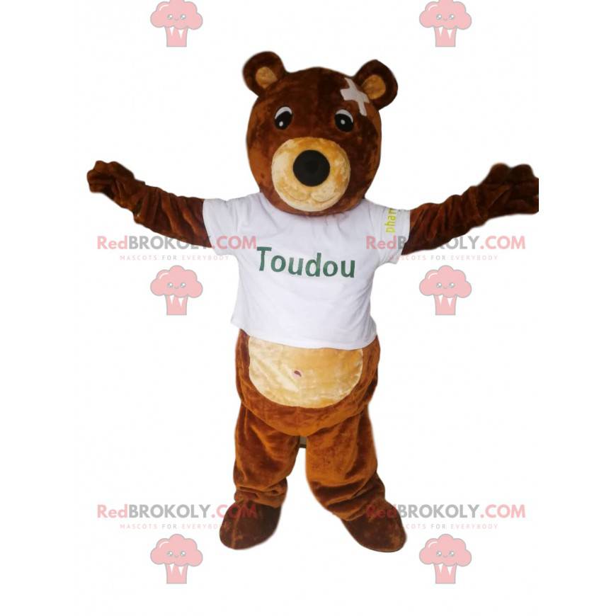 Brown bear mascot with a too short t-shirt and a bandage -