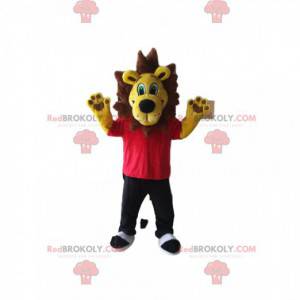 Mascota del león amarillo con una camiseta roja y pantalón