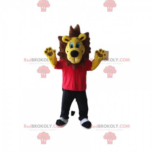 Mascota del león amarillo con una camiseta roja y pantalón
