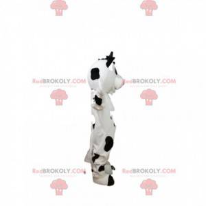 Mascote vaca preto e branco com um grande sorriso -