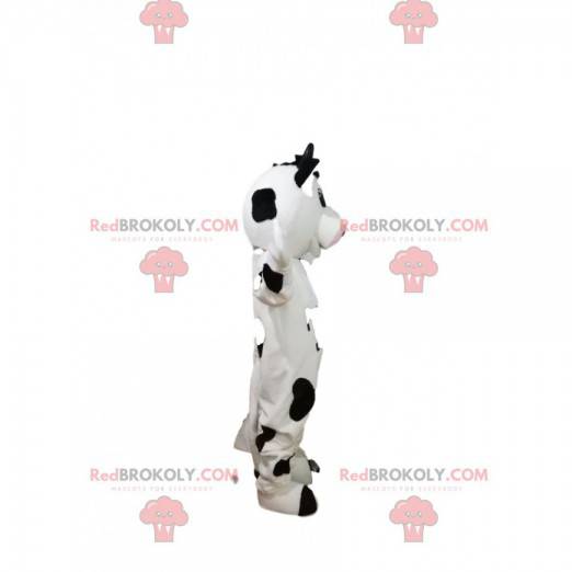 Mascote vaca preto e branco com um grande sorriso -