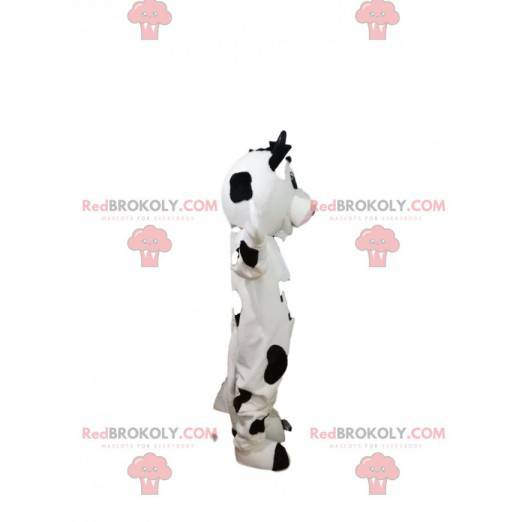 Svart och vit ko maskot med ett stort leende - Redbrokoly.com