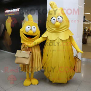 Gold Aglet mascot costume character dressed with a Maxi Skirt and Clutch bags