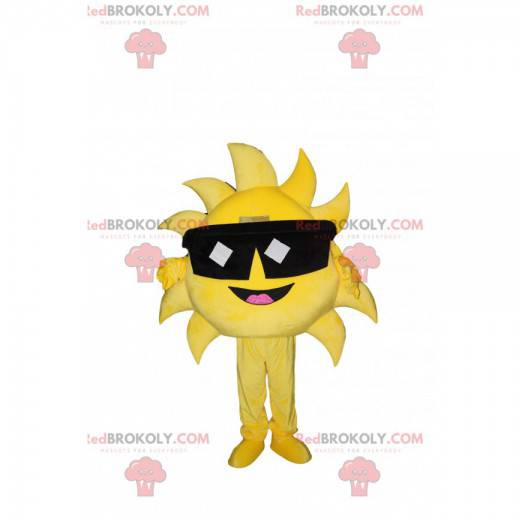 Mascota de sol muy feliz con gafas de sol. - Redbrokoly.com
