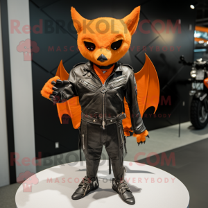 Orange Bat mascot costume character dressed with a Biker Jacket and Lapel pins