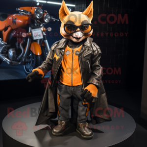 Orange Bat mascot costume character dressed with a Biker Jacket and Lapel pins