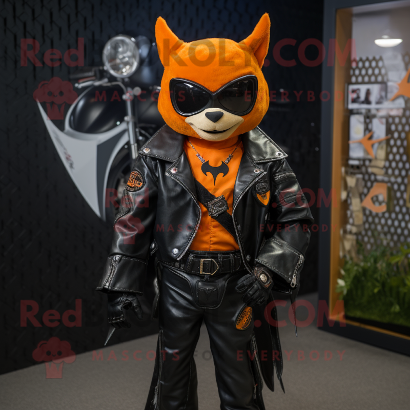 Orange Bat mascot costume character dressed with a Biker Jacket and Lapel pins