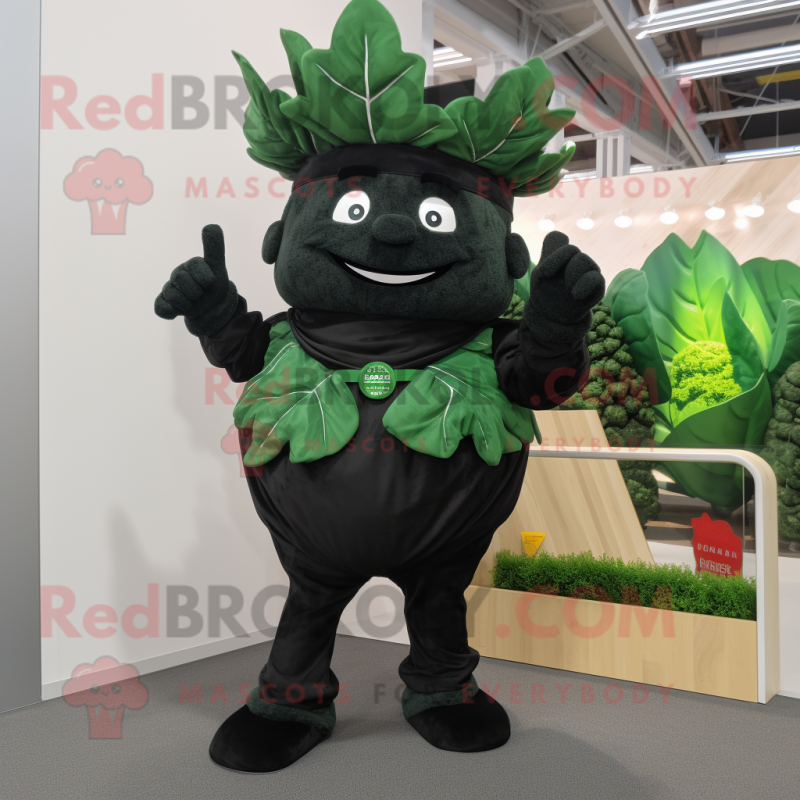 Black Cabbage Leaf mascot costume character dressed with a Dungarees and Rings Black Cabbage Leaf mascot costume character dressed with a Dungarees and Rings