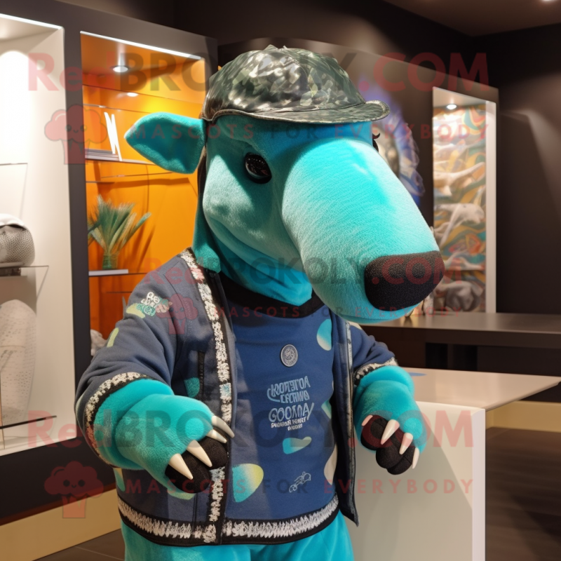 Turquoise Tapir mascot costume character dressed with a Graphic Tee and Hat pins