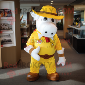 Yellow Hereford Cow mascot costume character dressed with a Polo Shirt and Hat pins