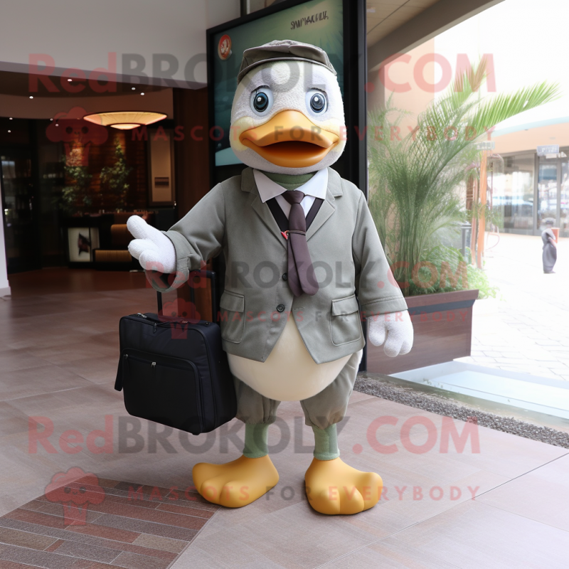 Olive Goose mascot costume character dressed with a Suit Pants and Backpacks