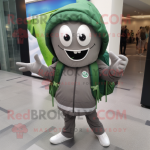 Gray Green Bean mascot costume character dressed with a Windbreaker and Backpacks