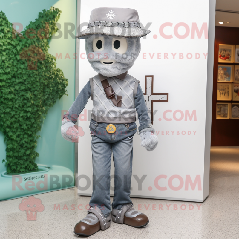 Silver Celtic Cross mascot costume character dressed with a Skinny Jeans and Hat pins Silver Celtic Cross mascot costume character dressed with a Skinny Jeans and Hat pins