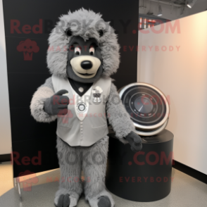 Gray Shepard'S Pie mascot costume character dressed with a Suit and Rings